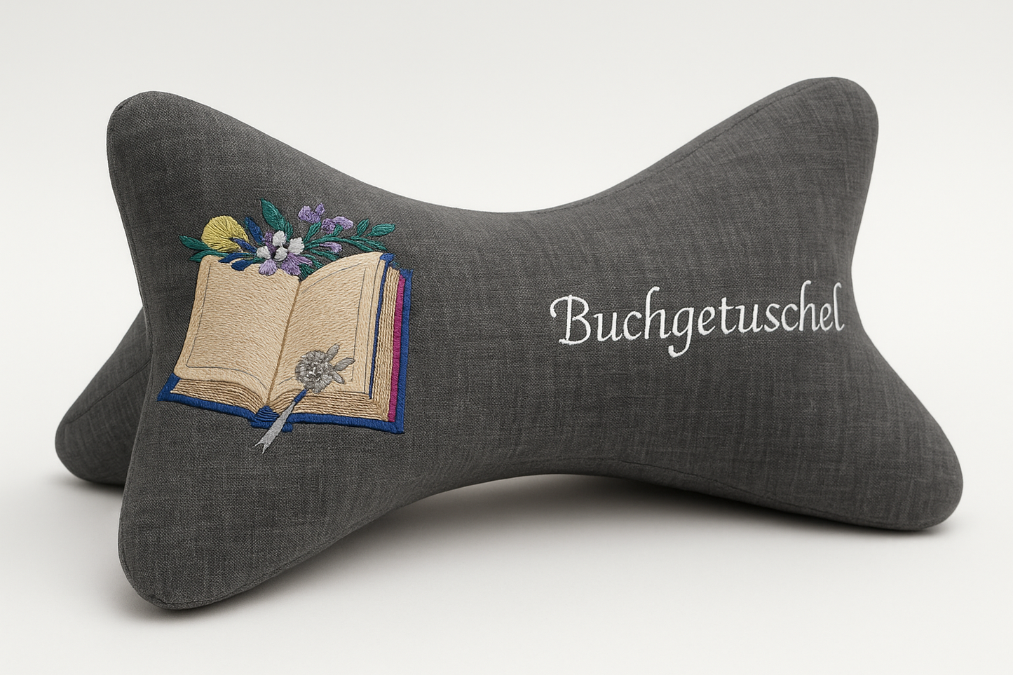 Leseknochen mit Buchgetuschel und aufgeklapptem Buch
