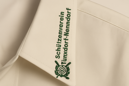 Shirt collar with embroidered text and logo